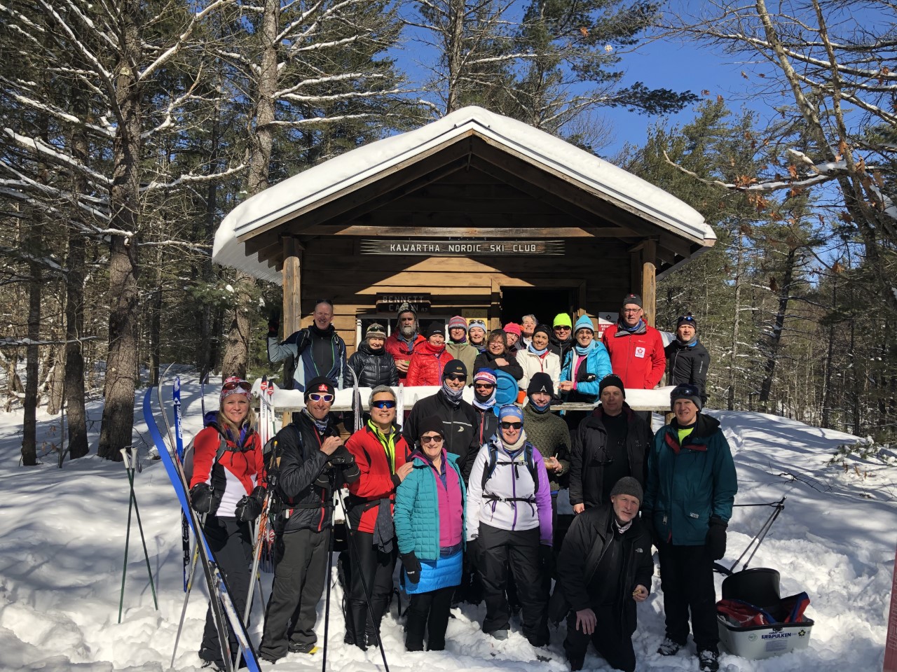 Photo of a group of skiers at the Bennett Cabin in winter